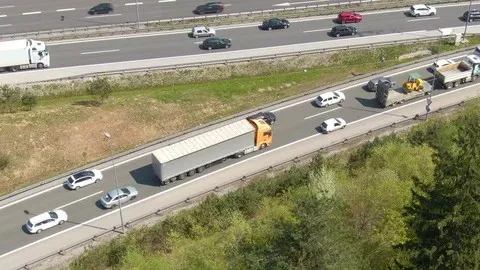 drone-big-orange-18-wheeler-footage-117136679_iconl_result.jpg